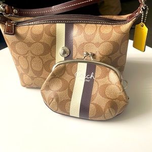 A small coach bag and change purse